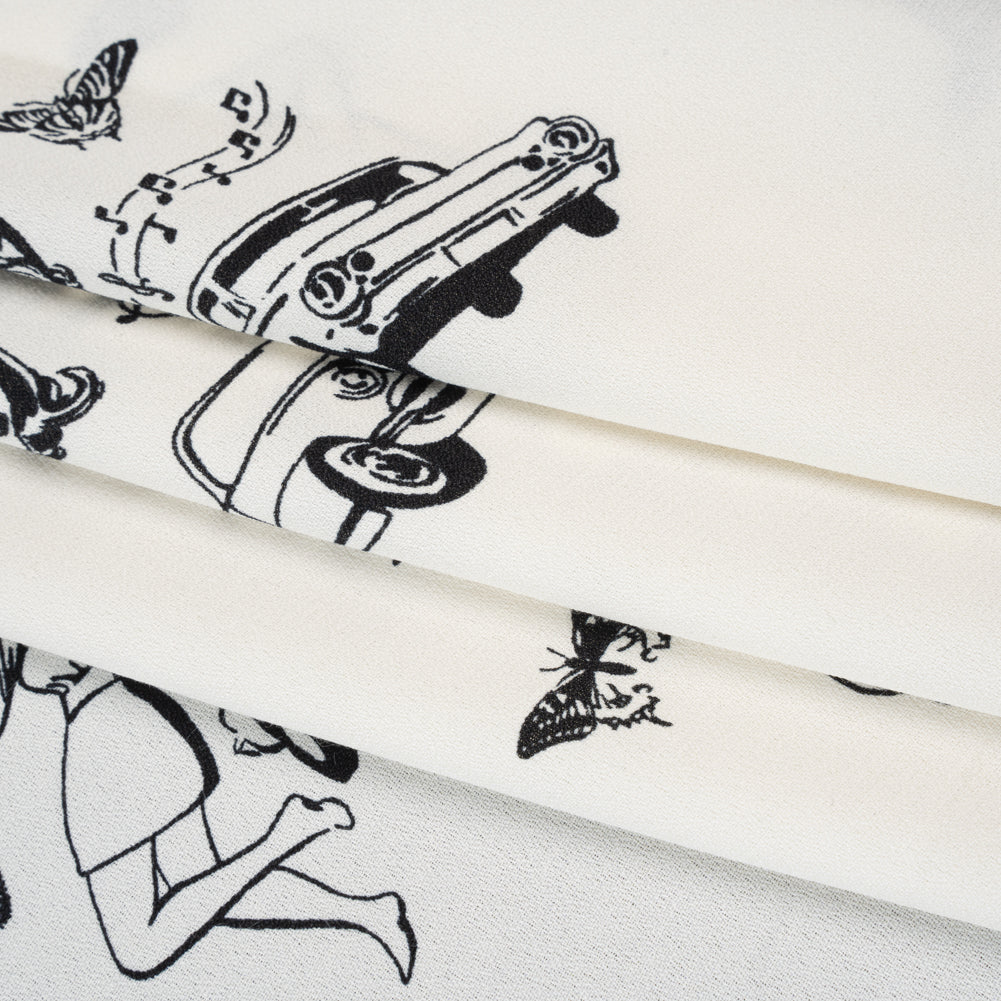 Sustainable Viscose Crepe Print - Jet Black and Light Cream Retro Cars and Ladies Illustration - Designer Deadstock - Folded Sustainable Viscose Crepe Print - Jet Black and Light Cream Retro Cars and Ladies Illustration - Designer Deadstock - Folded