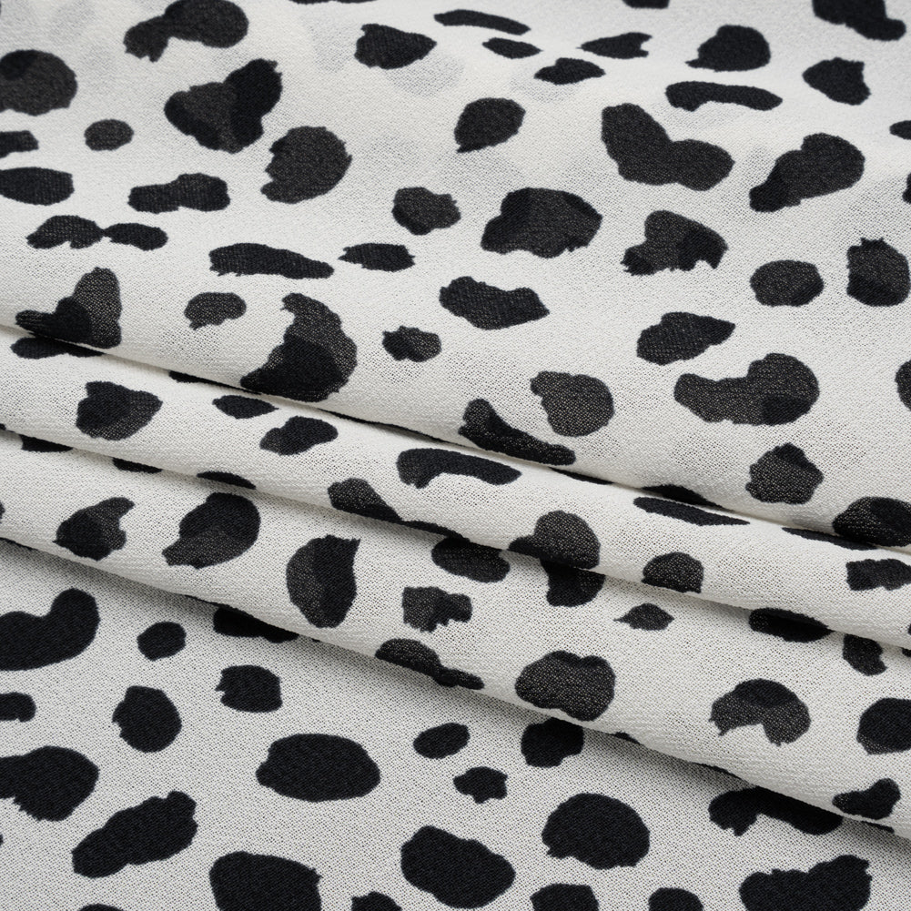Viscose Georgette Print by The Reformation - Black and Off White Painterly Cheetah Spots - Deadstock - Folded Viscose Georgette Print by The Reformation - Black and Off White Painterly Cheetah Spots - Deadstock - Folded