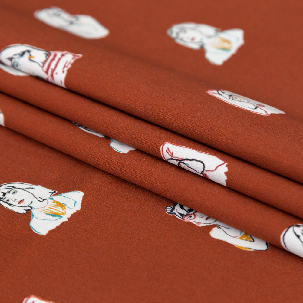Stretch Cotton Sateen - Rust Faces - Run the World Print - Mood Exclusive Harvest Collection Stretch Cotton Sateen - Rust Faces - Run the World Print - Mood Exclusive Harvest Collection