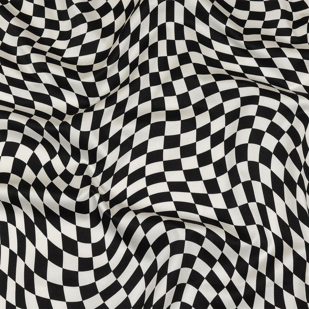 Stretch Cotton Sateen - Black and White Warped Checks - Down the Rabbit Hole Print - Mood Exclusive Indigo Collection Stretch Cotton Sateen - Black and White Warped Checks - Down the Rabbit Hole Print - Mood Exclusive Indigo Collection