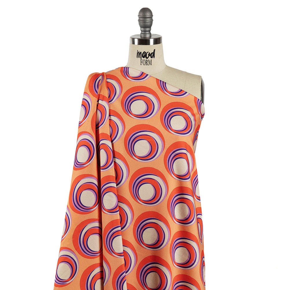 Stretch Cotton Sateen - Orange and Purple Circles - Stop The Beat Print - Mood Exclusive Yesterday Collection - Drape Stretch Cotton Sateen - Orange and Purple Circles - Stop The Beat Print - Mood Exclusive Yesterday Collection - Drape