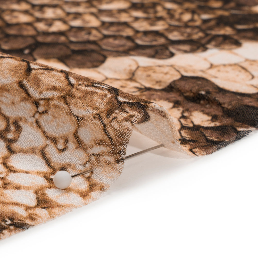 Viscose Georgette - Beige and Brown Snakeskin - Kaa's Charm Print - Mood Exclusive Kilimanjaro Collection Viscose Georgette - Beige and Brown Snakeskin - Kaa's Charm Print - Mood Exclusive Kilimanjaro Collection