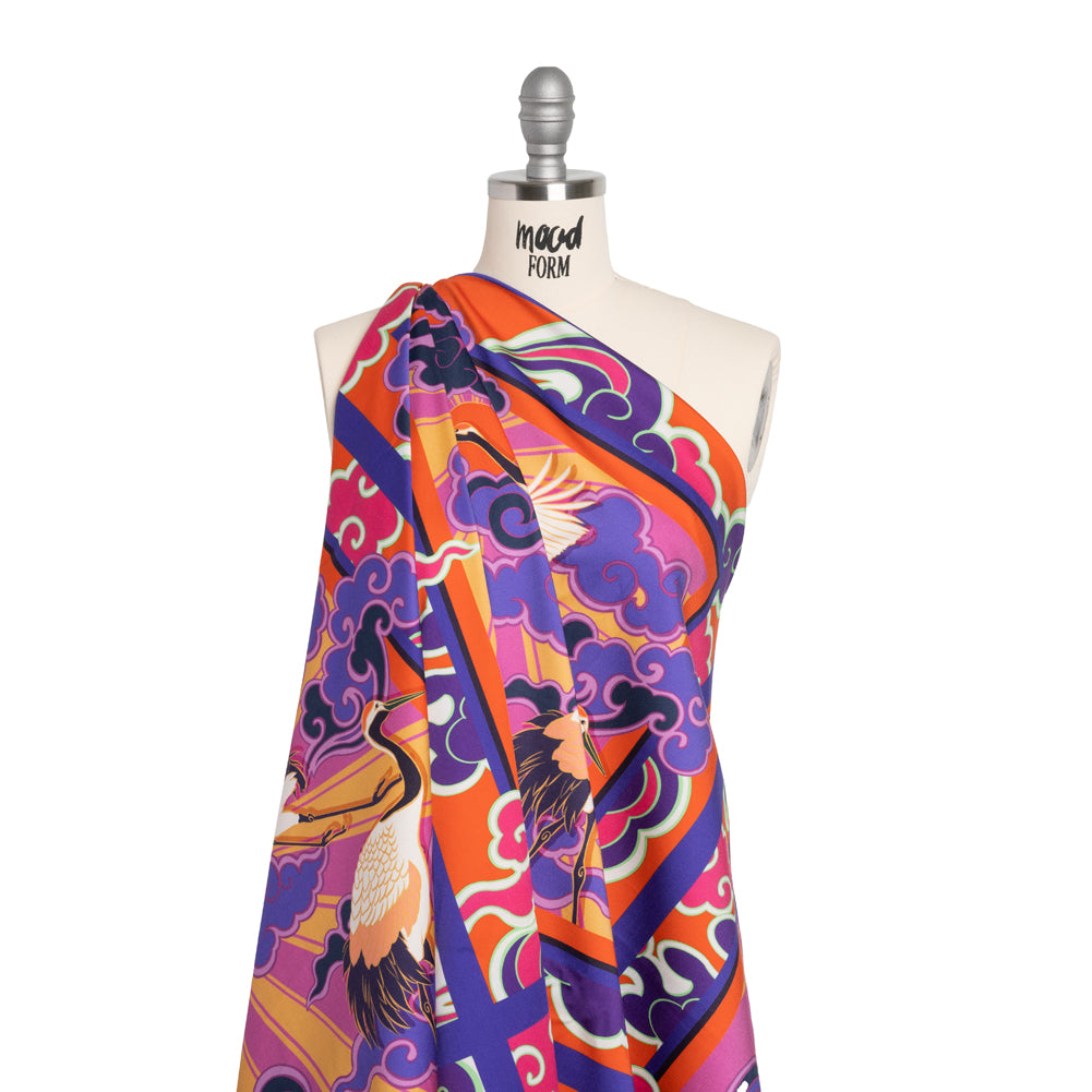 Stretch Cotton Sateen Panel - Purple and Orange Cranes and Clouds - Sunrise Flight Print - Mood Exclusive Chariot Collection Stretch Cotton Sateen Panel - Purple and Orange Cranes and Clouds - Sunrise Flight Print - Mood Exclusive Chariot Collection