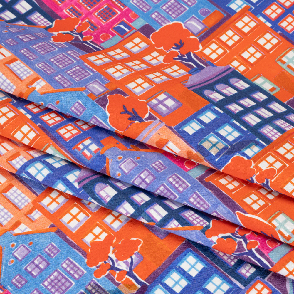 Stretch Cotton Sateen - Purple, Orange and Blue Houses - Sunlit City Print - Mood Exclusive Chariot Collection - Folded Stretch Cotton Sateen - Purple, Orange and Blue Houses - Sunlit City Print - Mood Exclusive Chariot Collection - Folded