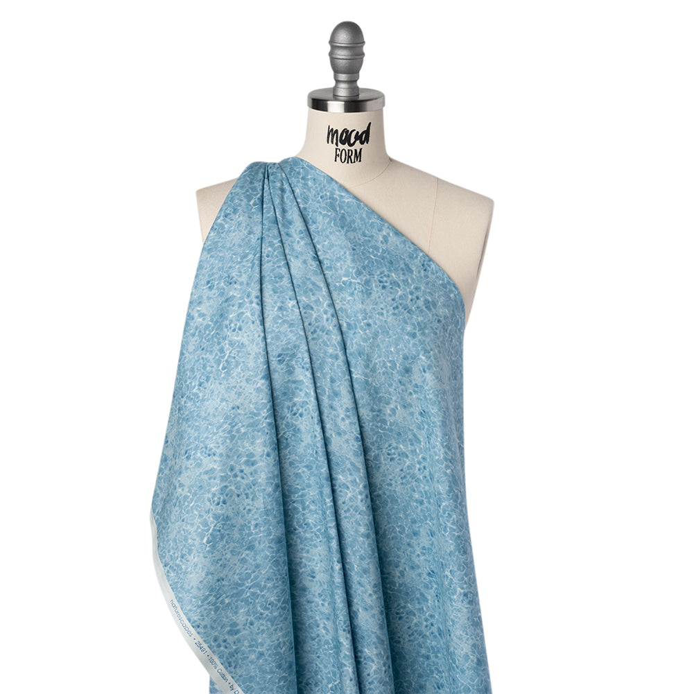 Printed Quilting Cotton by Northcott Studio - Mid Blue Tranquil Water - Naturescapes Collection - Drape Printed Quilting Cotton by Northcott Studio - Mid Blue Tranquil Water - Naturescapes Collection - Drape