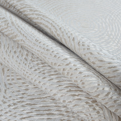 Champagne Geometric Swirls on a Cotton and Polyester Woven - Folded