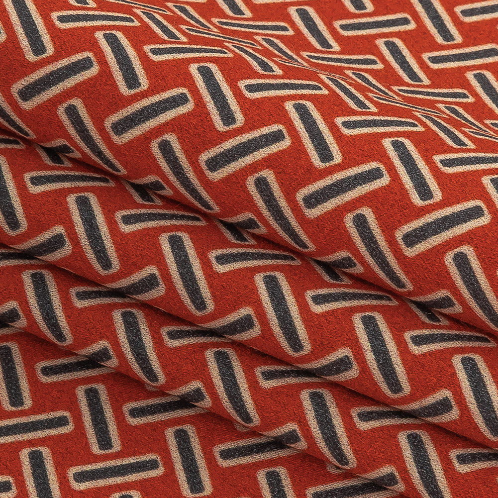Stretch Cotton and Viscose Sateen Print - Burnt Orange and Blue Geometric Lattice - Mood Exclusive Cylindrically Angled Folded
