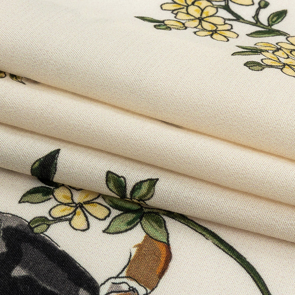 Sustainable Viscose Woven Print - Ivory and Green Birds in Branches - Mood Exclusive Avian Adoration Folded