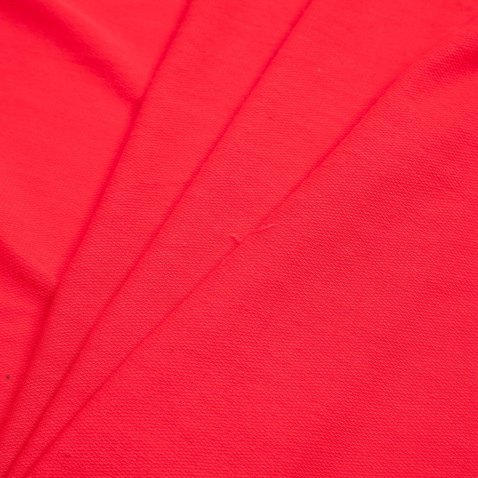 Neon Coral Polyester-Rayon Stretch French Terry Cloth Folded