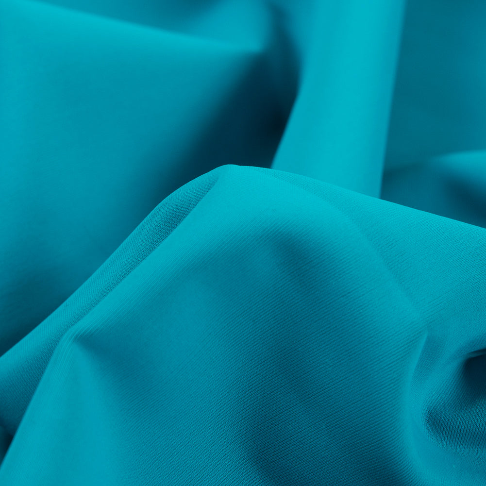 5.6 oz Teal Blue Matte Tricot w/ High Compression - Detail