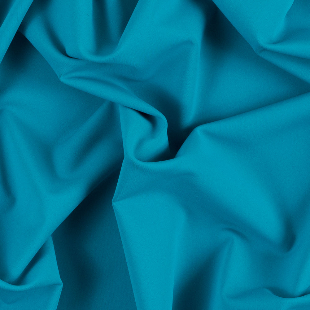 5.6 oz Teal Blue Matte Tricot w/ High Compression