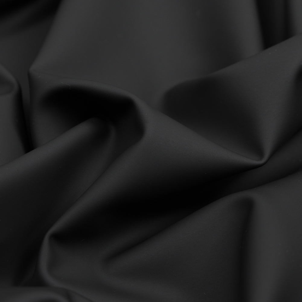 Tricot elástico impermeable de protección UV negro - Piel sintética