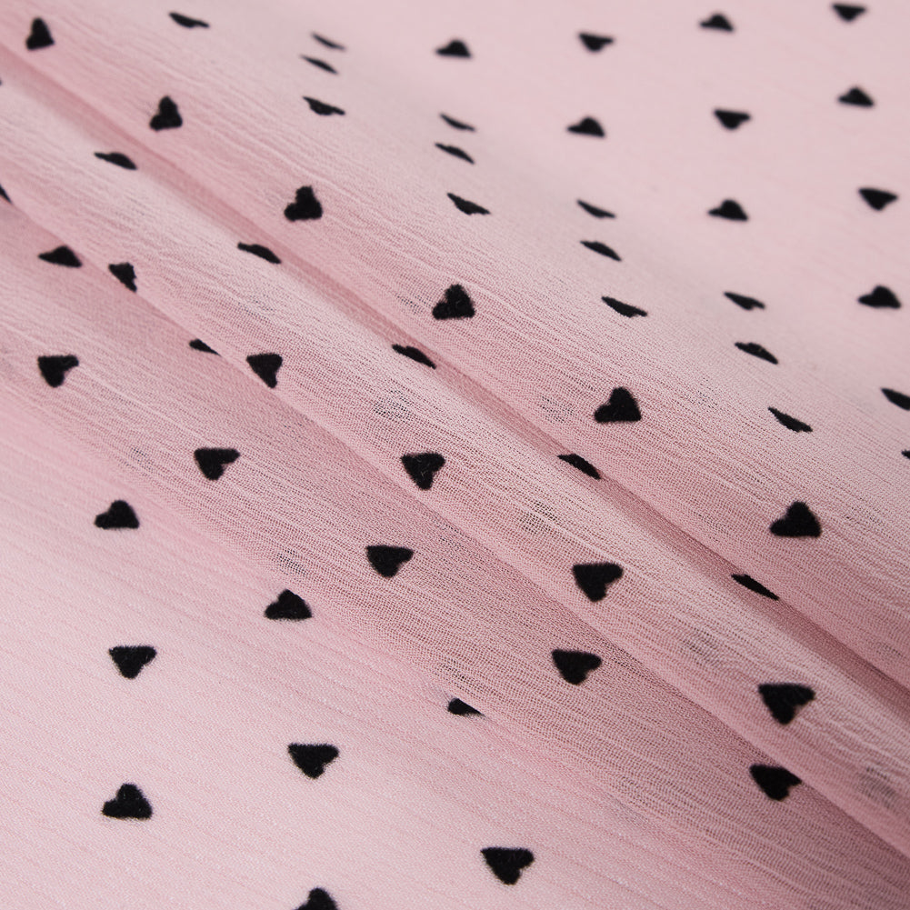 Black Hearts Printed on a Pink Crinkled Chiffon Folded