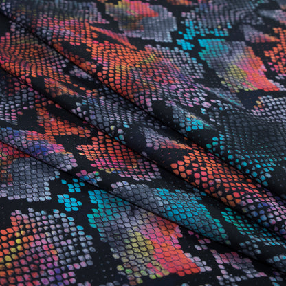 Compression Swimwear Tricot, UV Protective with Aloe Vera Microcapsules - Orange and Blue Python - Caye Collection Folded