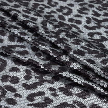 Knit Fabric with Snow Leopard Foil and Circle Sequins - Black and White on Black Folded