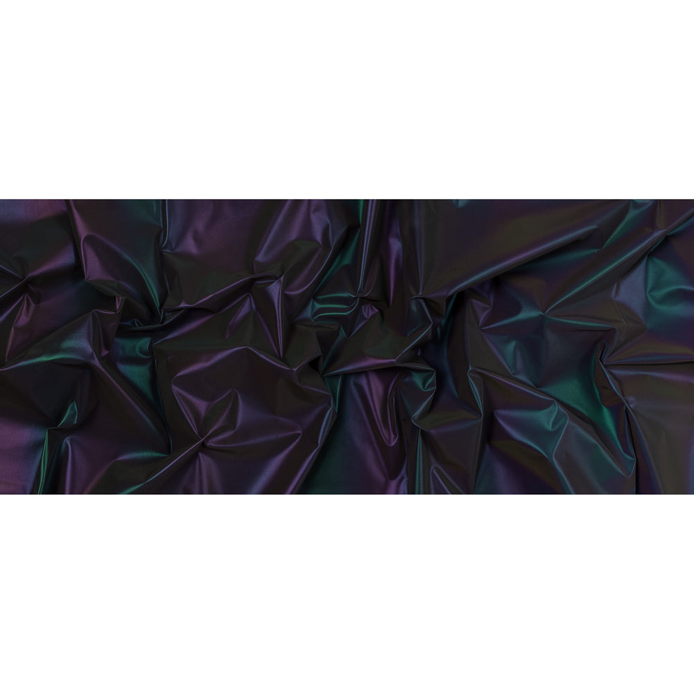 Rainbow Reflective Fabric with Cotton Backing Folded