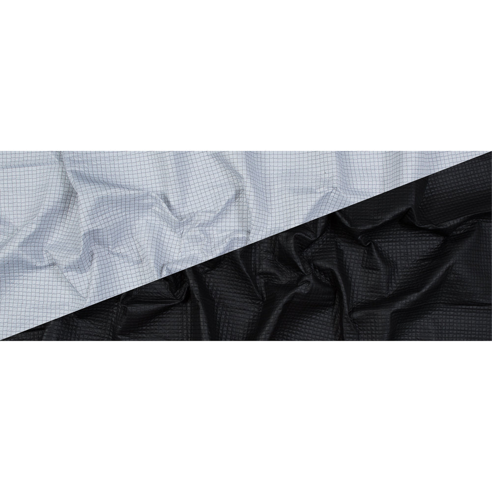 Black and White Reversible Quilted Coating with Filler Folded