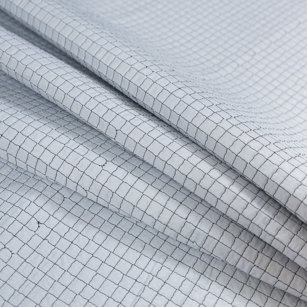 Black and White Reversible Quilted Coating with Filler Detail