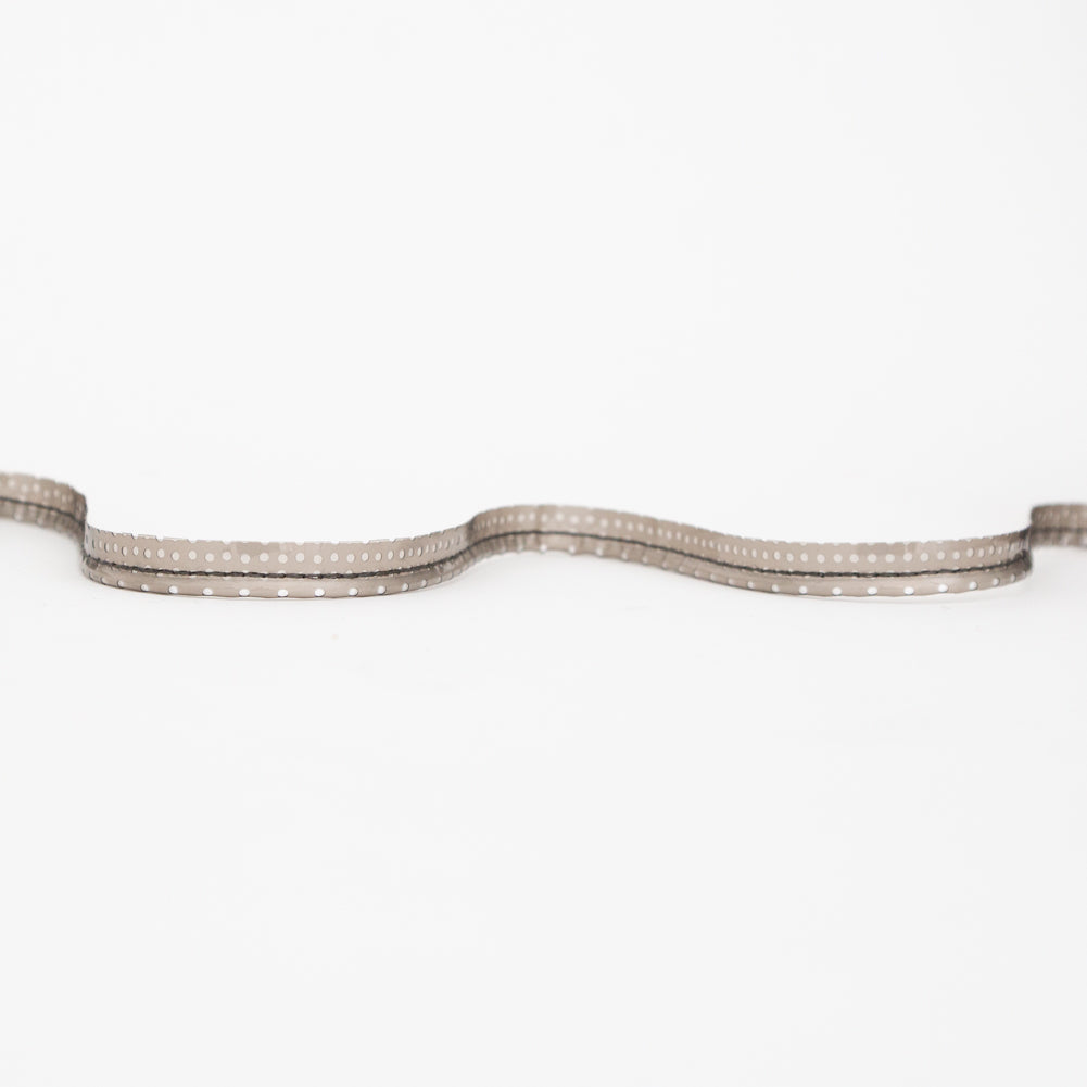 Italian White Rattail Piping with Black Perforated Plastic Casing and Lip - 0.375"