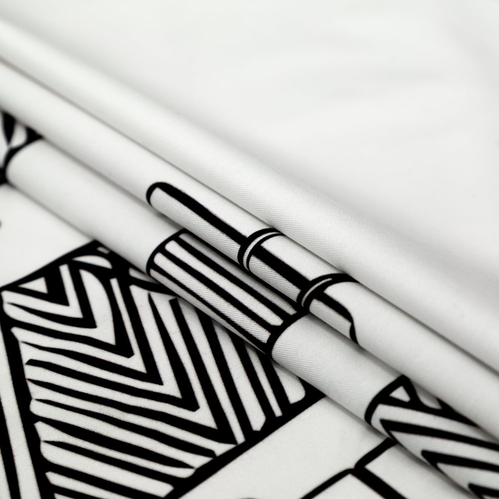 Stretch Carbon Brush Twill - White and Black Thread Spools Border - Thread Tower Print - Mood Exclusive Haberdashery Collection Detail