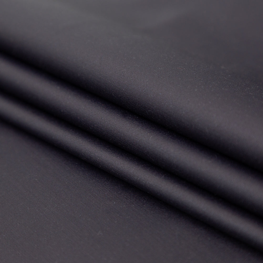 Italian Indigo Stretch Cotton Twill with a Waxy Laminate Folded