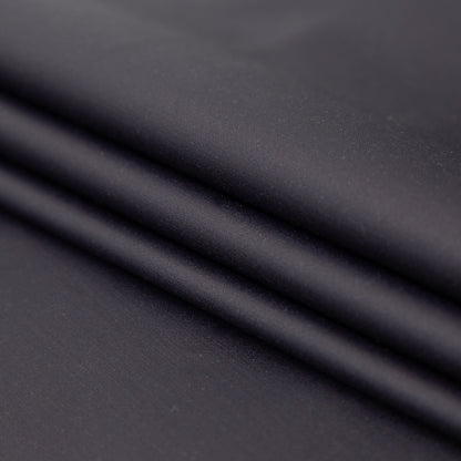 Italian Indigo Stretch Cotton Twill with a Waxy Laminate Folded
