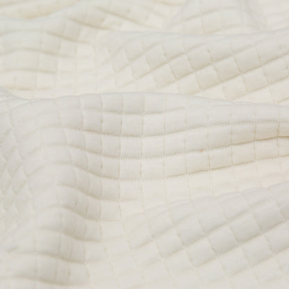 Italian Cream Quilted Rayon Knit with Filler and Polyester Knit Backing Detail