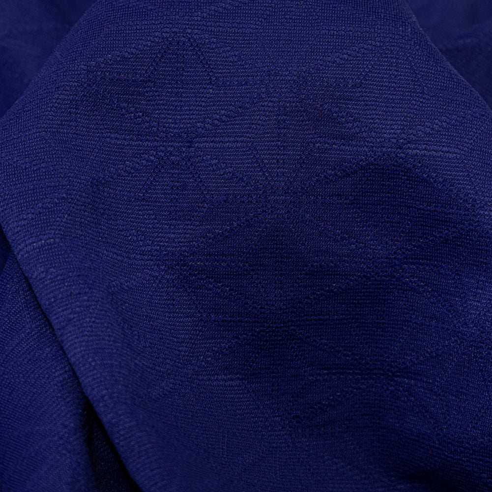 Italian Heathered Gray and Spectrum Blue Geometric Stretch Quilted Knit Coating Detail