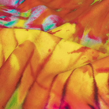 Traje de baño de compresión de tricot, con protección UV y microcápsulas de aloe vera - Estampado tie-dye verde y naranja veraniego - Colección Caye