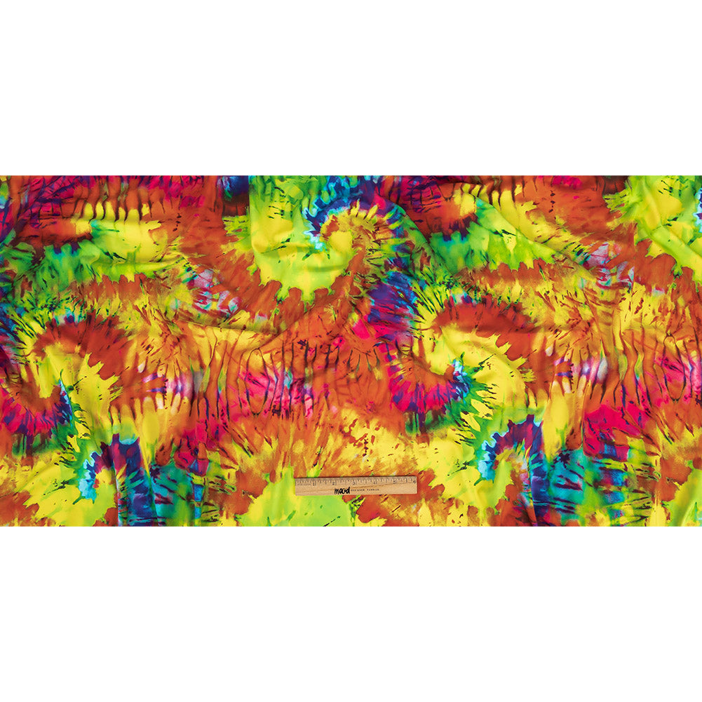 Traje de baño de compresión de tricot, con protección UV y microcápsulas de aloe vera - Estampado tie-dye verde y naranja veraniego - Colección Caye