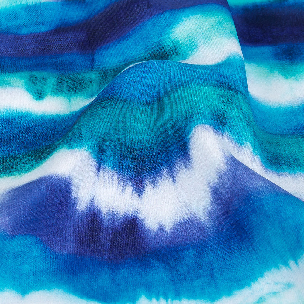 Traje de baño de compresión de tricot, con protección UV y microcápsulas de aloe vera - Rayas tie-dye en azul ultramarino intenso, verde azulado y blanco - Colección Caye