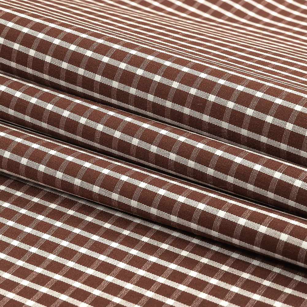 Brown and White Checkered Cotton and Polyester Shirting Folded