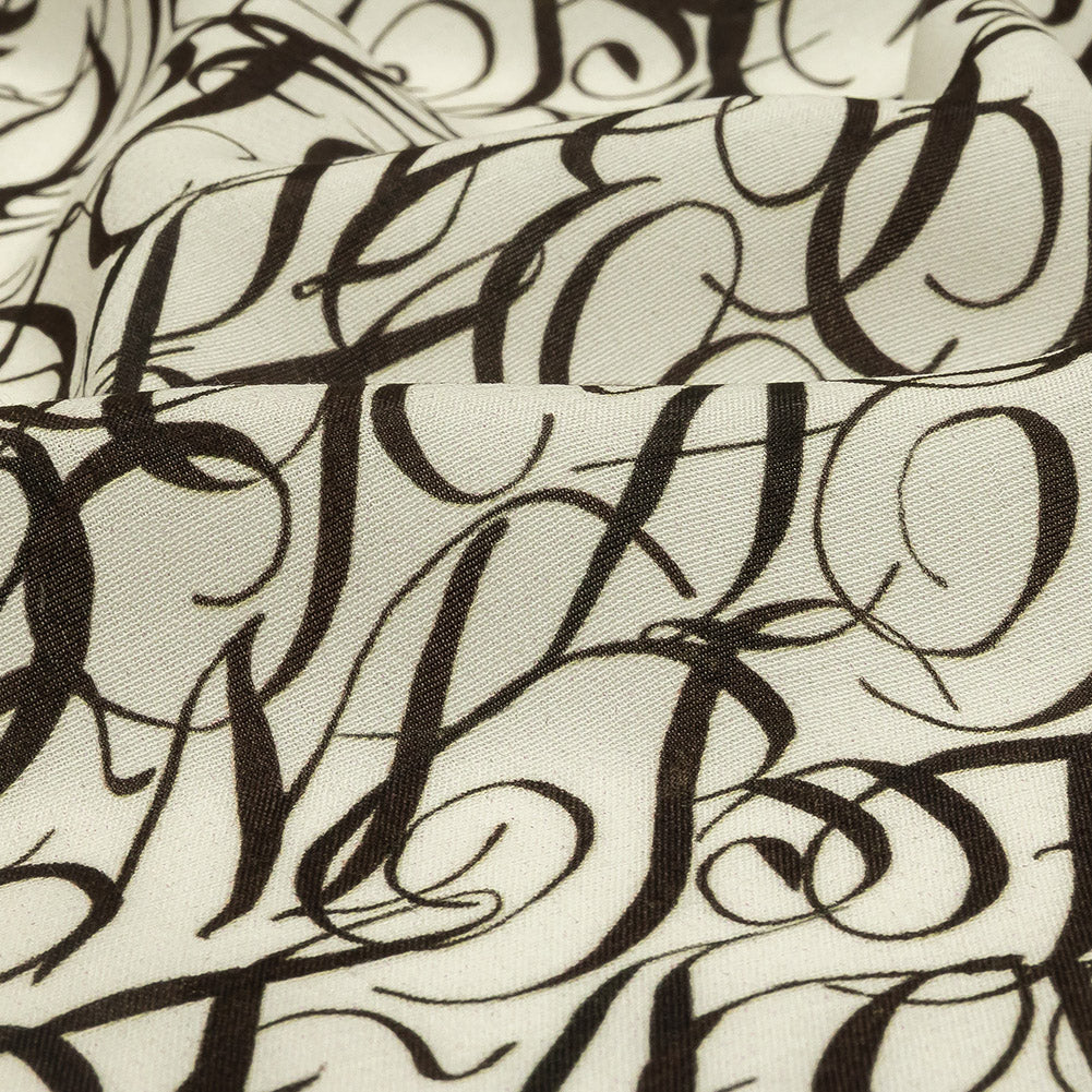 Sustainable Viscose Woven Print - White Calligraphic Letters - Mood Exclusive Dear Ms. Austen Detail