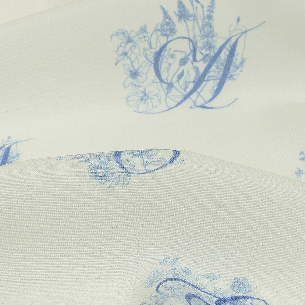 Sustainable Viscose Woven Print - White and Blue Floral Calligraphic Script - Mood Exclusive ABC Bouquet Detail