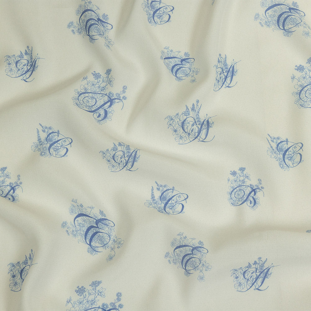 Sustainable Viscose Woven Print - White and Blue Floral Calligraphic Script - Mood Exclusive ABC Bouquet