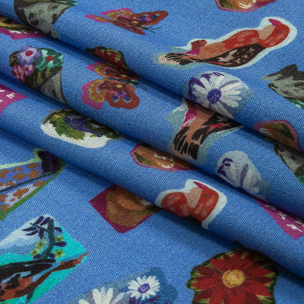 Sustainable Viscose Woven Print - Ultramarine Blue Floral Stickers - Mood Exclusive Sticking Power Folded