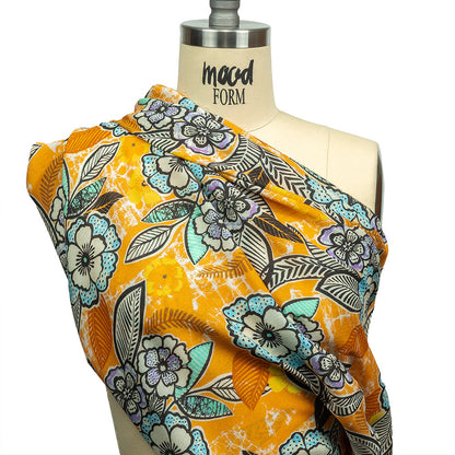 Gauzy Wrinkled Rayon Woven Print - Butterscotch Orange and Blue Floral - Mood Exclusive Blackened Buds Detail