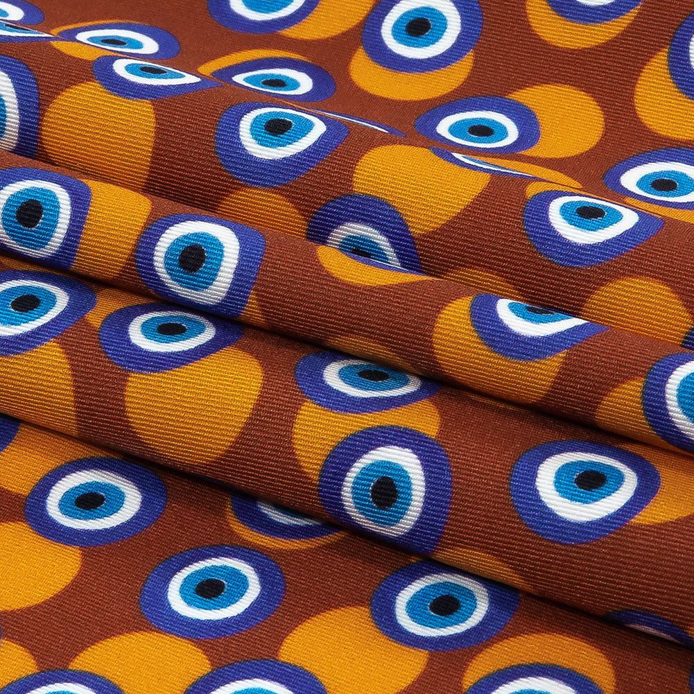 Blue and Brown Bouncing Evil Eye Caye UV Protective Compression Swimwear Tricot with Aloe Vera Microcapsules - Folded