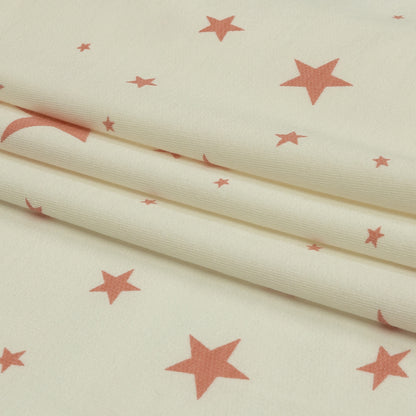 Cloud Dancer and Coral Almond Stars Stretch Polyester and Rayon French Terry Folded