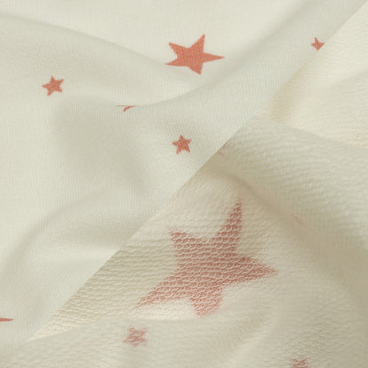 Cloud Dancer and Coral Almond Stars Stretch Polyester and Rayon French Terry Detail