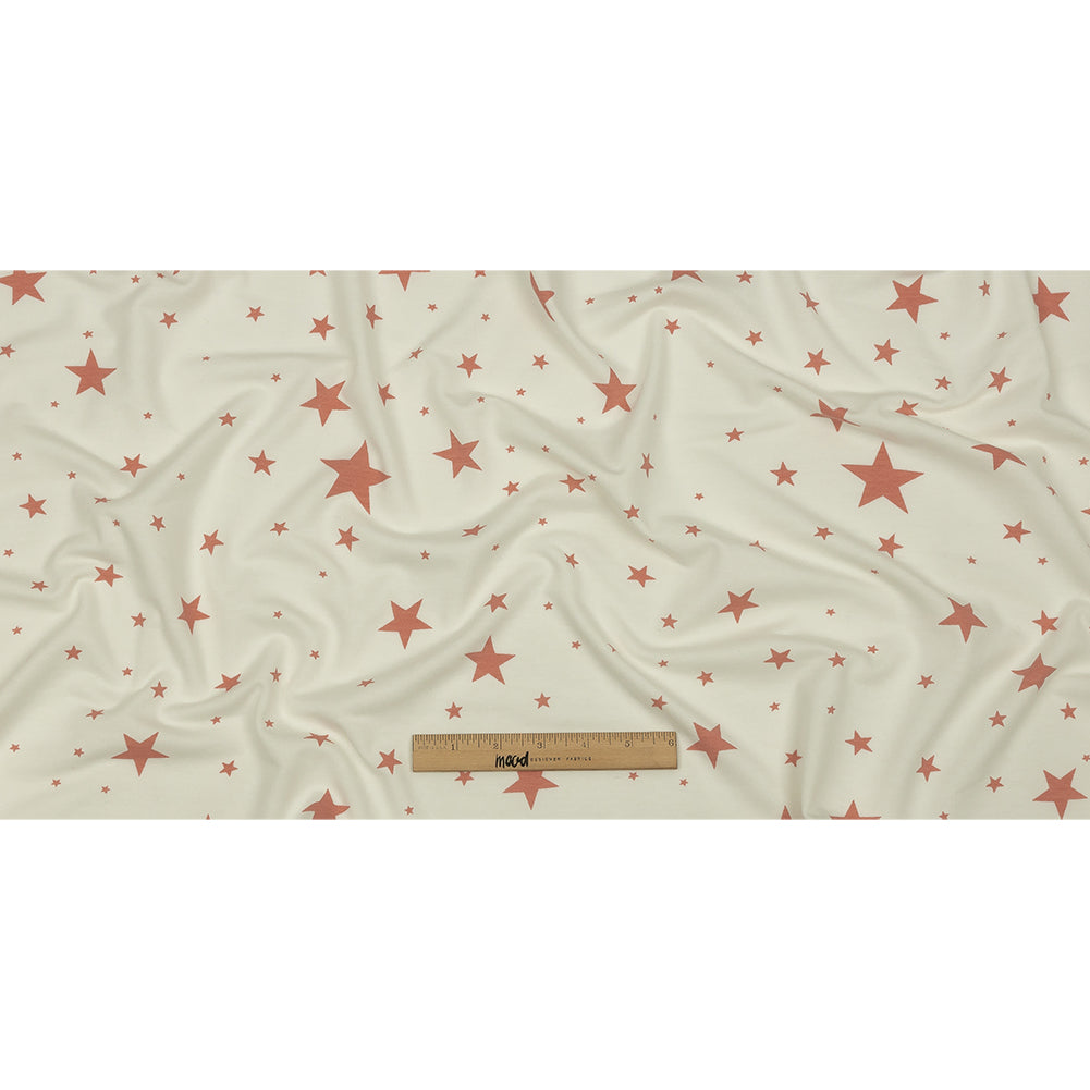 Cloud Dancer and Coral Almond Stars Stretch Polyester and Rayon French Terry Full