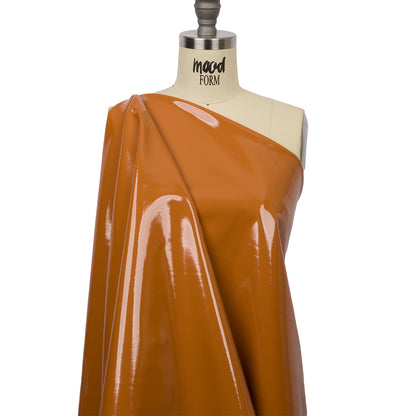 Tan Stretch Faux Patent Leather with White Viscose Jersey Backing Drape