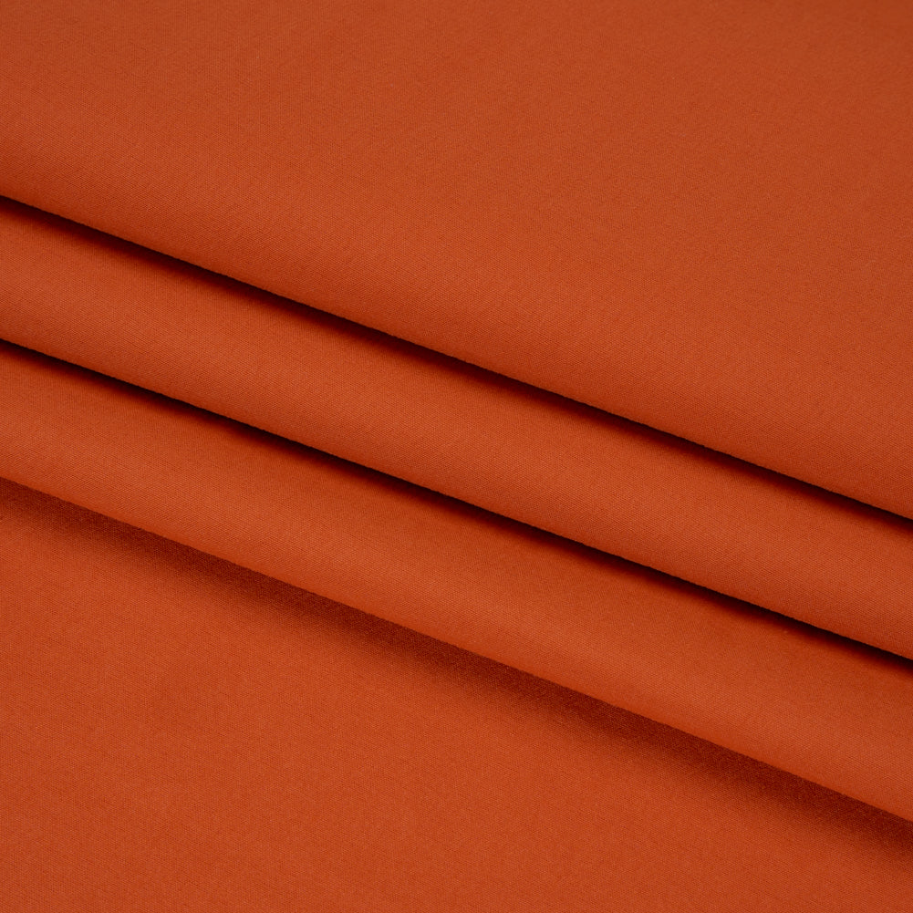 Creped Stretch Polyester Woven - Burnt Orange Folded