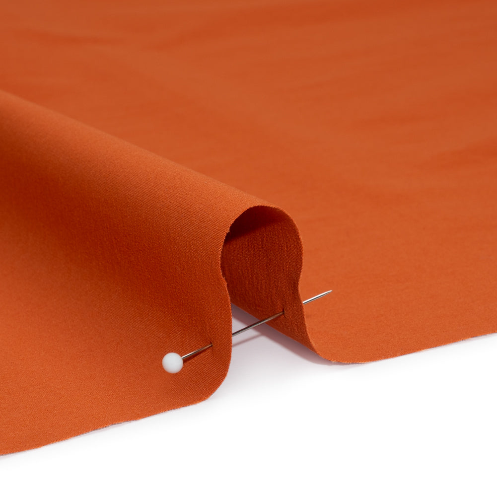 Creped Stretch Polyester Woven - Burnt Orange Detail