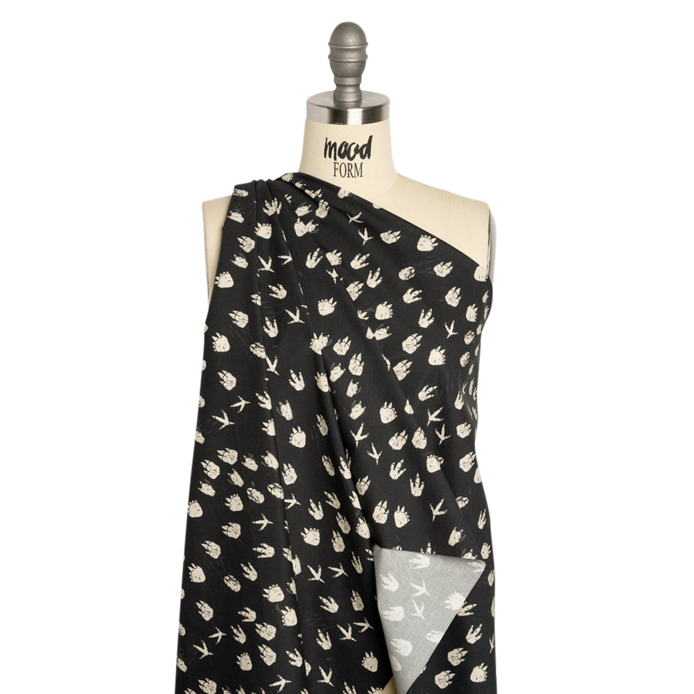 Stretch Cotton Poplin Print - Black Dinosaur Footprints - Mood Exclusive Jurassic Jubilee Drape