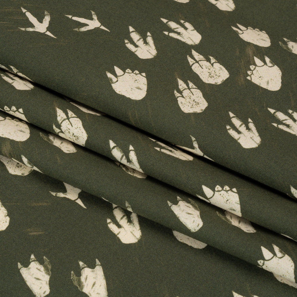 Stretch Cotton Poplin Print - Dark Olive Dinosaur Footprints - Mood Exclusive Jurassic Jubilee Folded