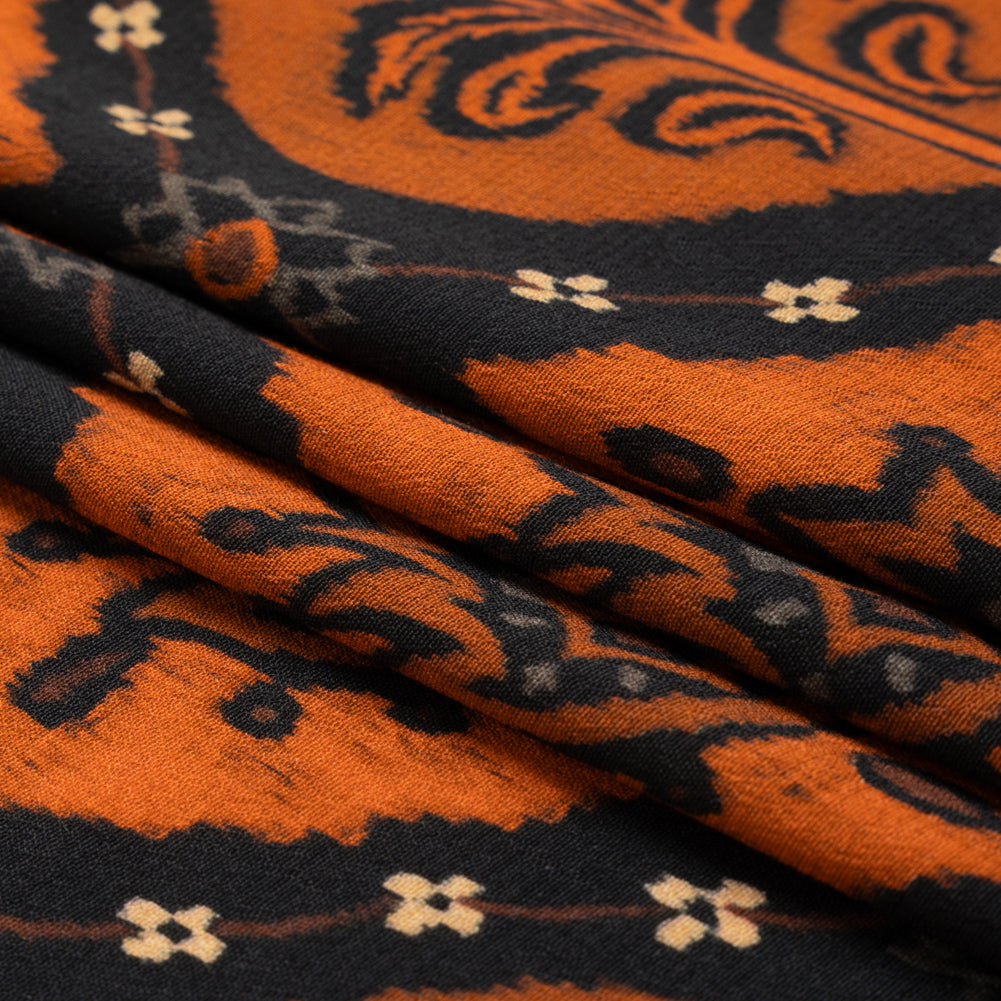 Sustainable Viscose Crepe Print - Orange and Black Floral Ogees - Mood Exclusive Salem Surroundings Folded