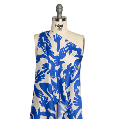 Sustainable and Recycled Viscose Satin Print - Blue and White Hands - Mood Exclusive Helping Hands Detail