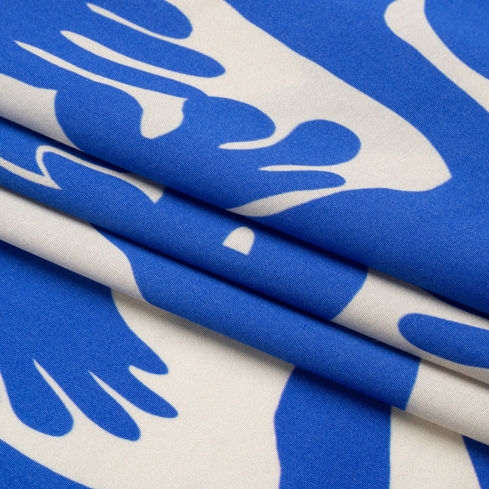 Sustainable and Recycled Viscose Satin Print - Blue and White Hands - Mood Exclusive Helping Hands Full