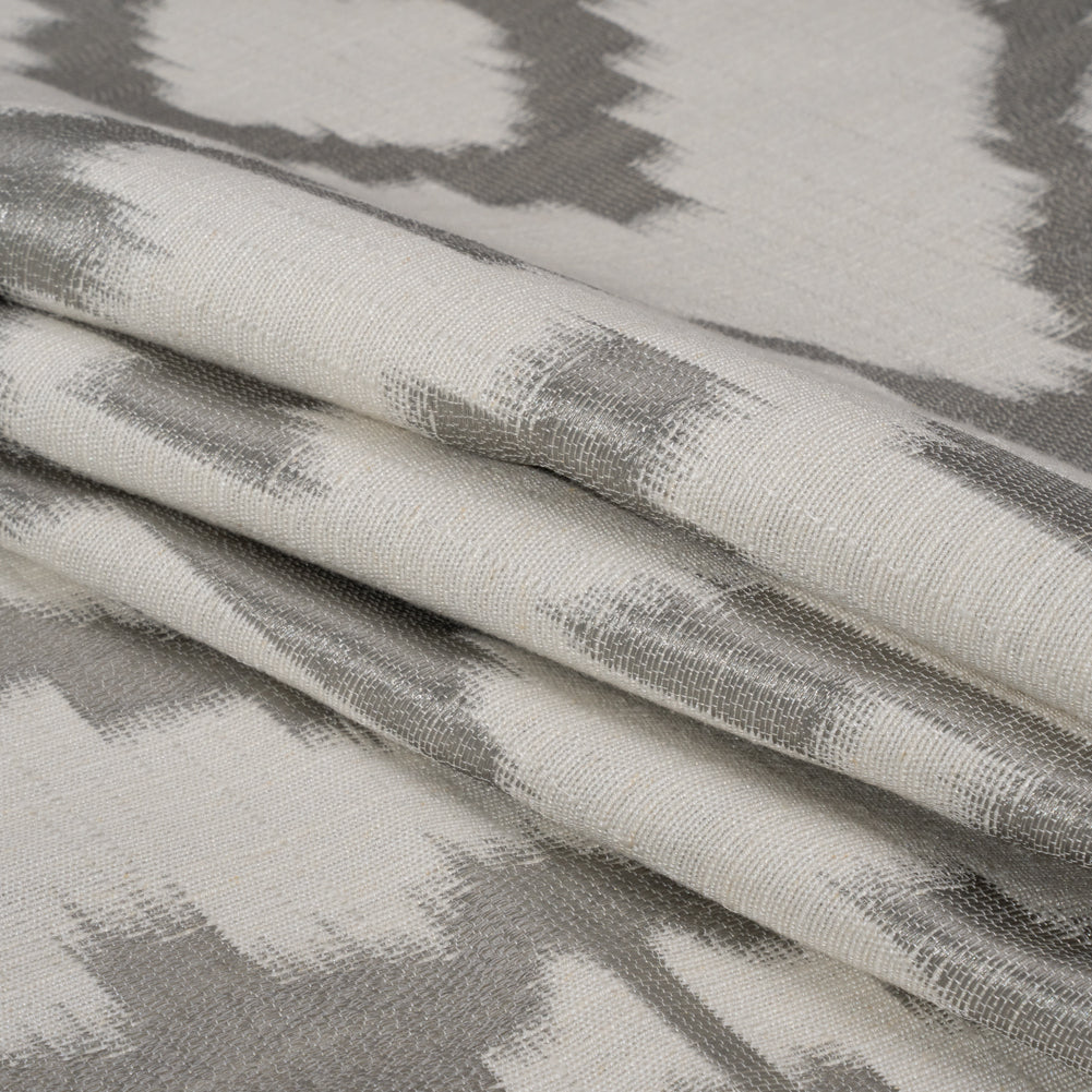 White and Silver Geometric Ikat Viscose, Polyester and Linen Drapery Jacquard Folded